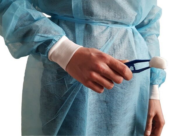 Isolation gown with cotton cuffs